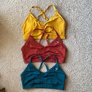 Gymshark Vibrant Sports Bra Trio - Mustard, Rust, Teal